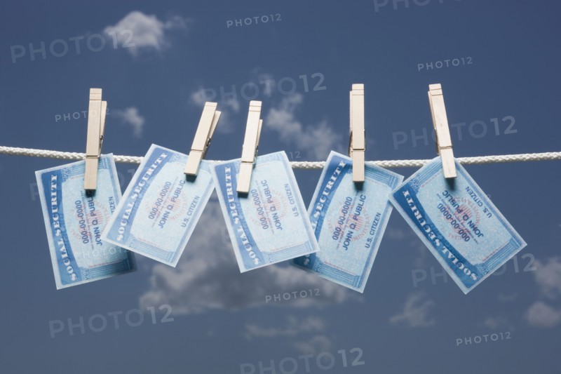 Social security cards on clothes line
