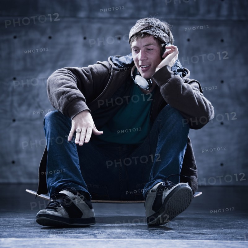 Male Skateboarder on phone