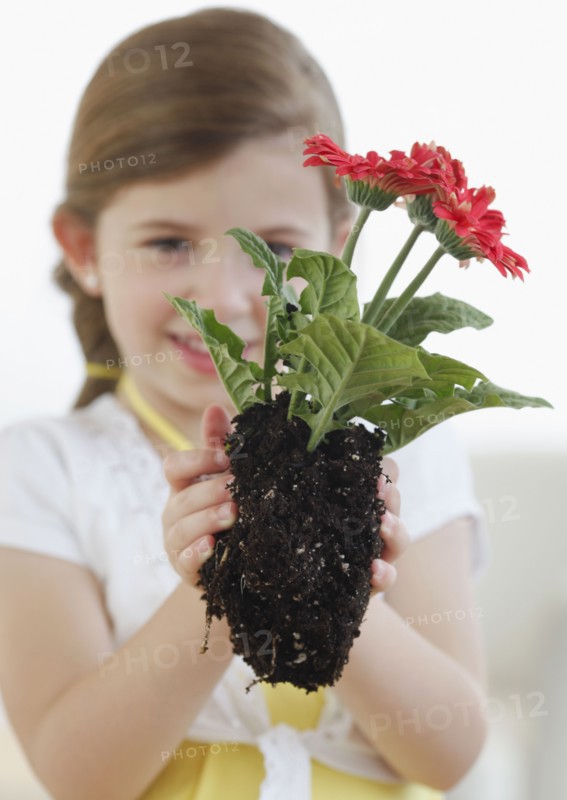Child with plant