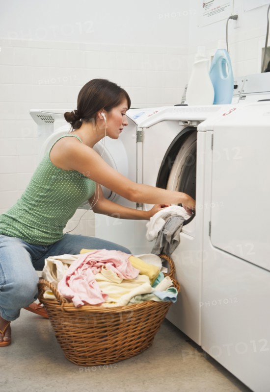 Woman washing clothes.