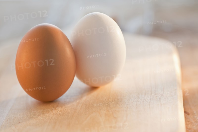 Brown and white eggs.