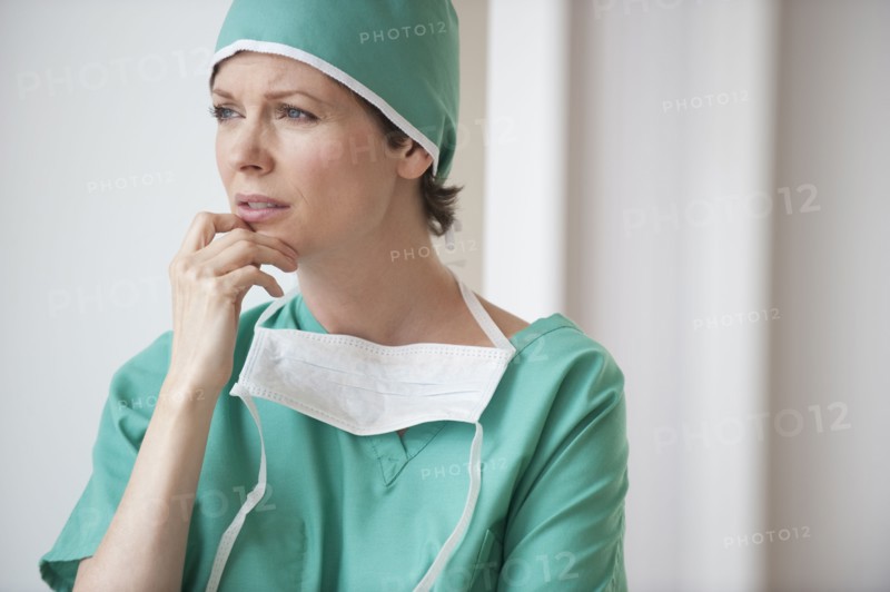 Female doctor looking concerned.