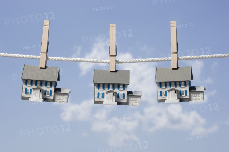 Symbolic houses on clothes line