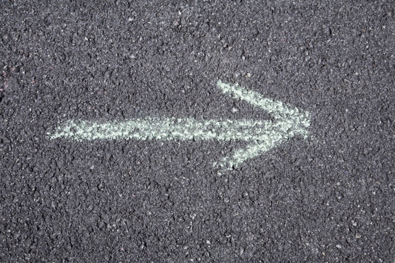 Arrow pointing right on pavement