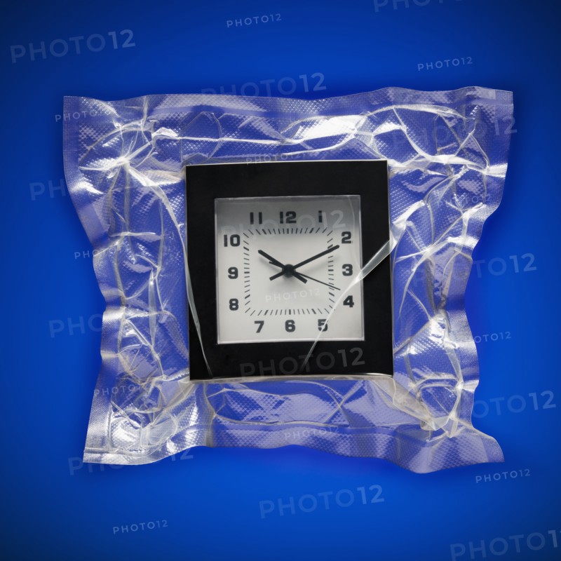 Shrink wrapped clock