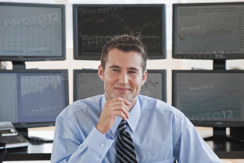 Male trader at work.