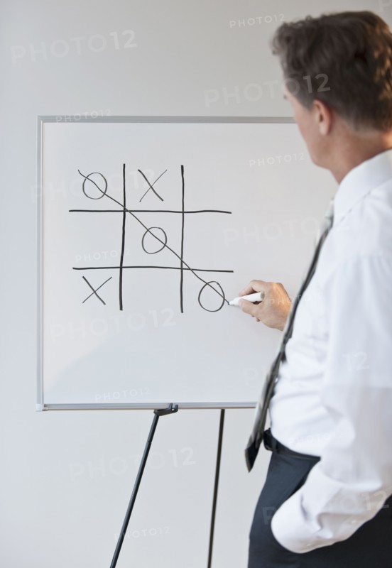Businessman drawing concept for winning.
