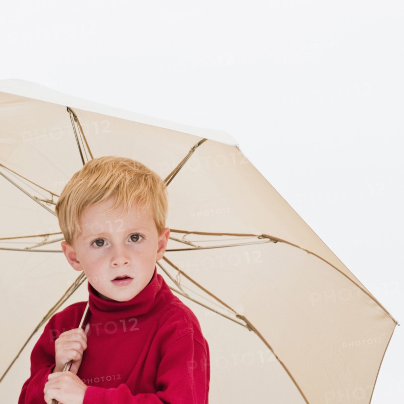 Child with umbrella.