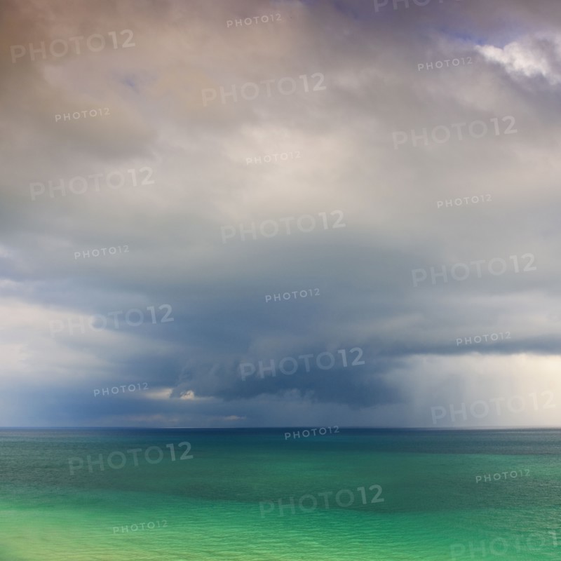 Clouds over ocean.