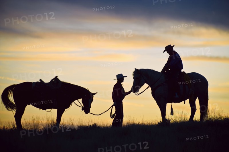Horseback riders.