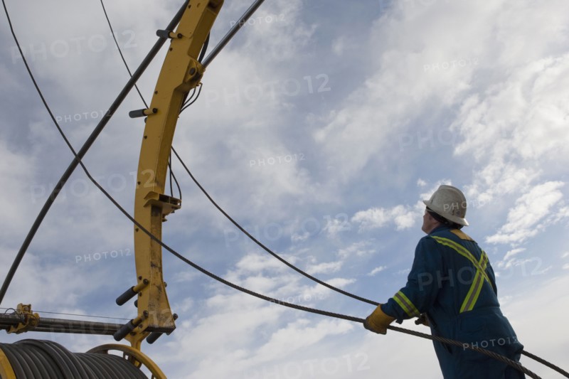 Man working with drilling equipment