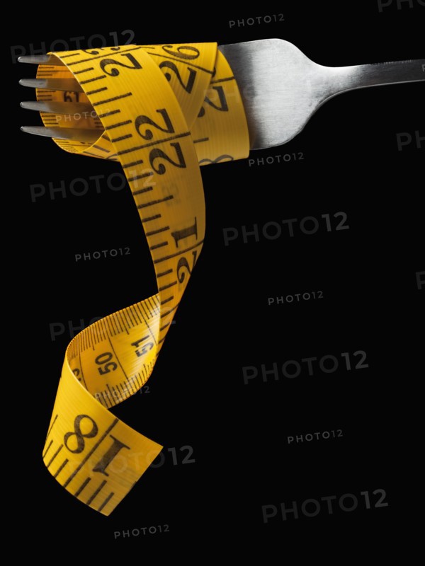 Measuring tape around fork