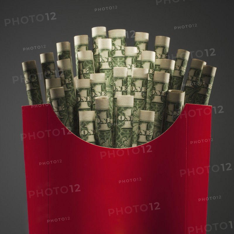 Money in French fry packaging