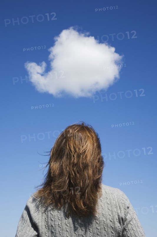 Woman looking at cloud