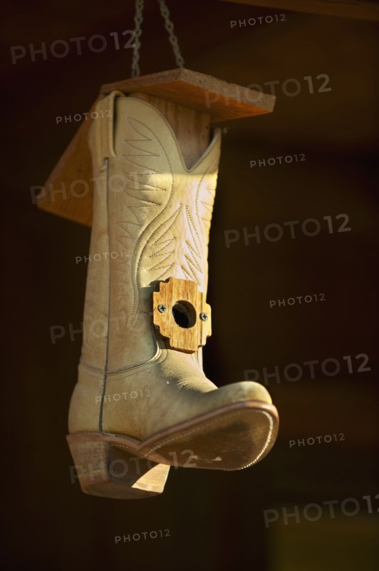 Cowboy boot bird house.