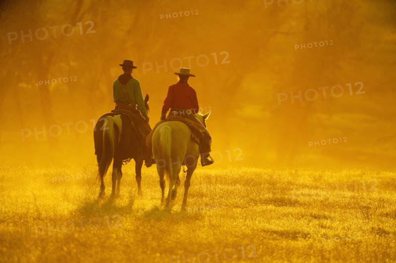 Horseback riders.
