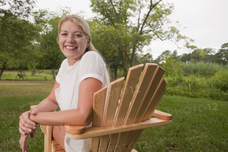 Woman in Adirondack chair
