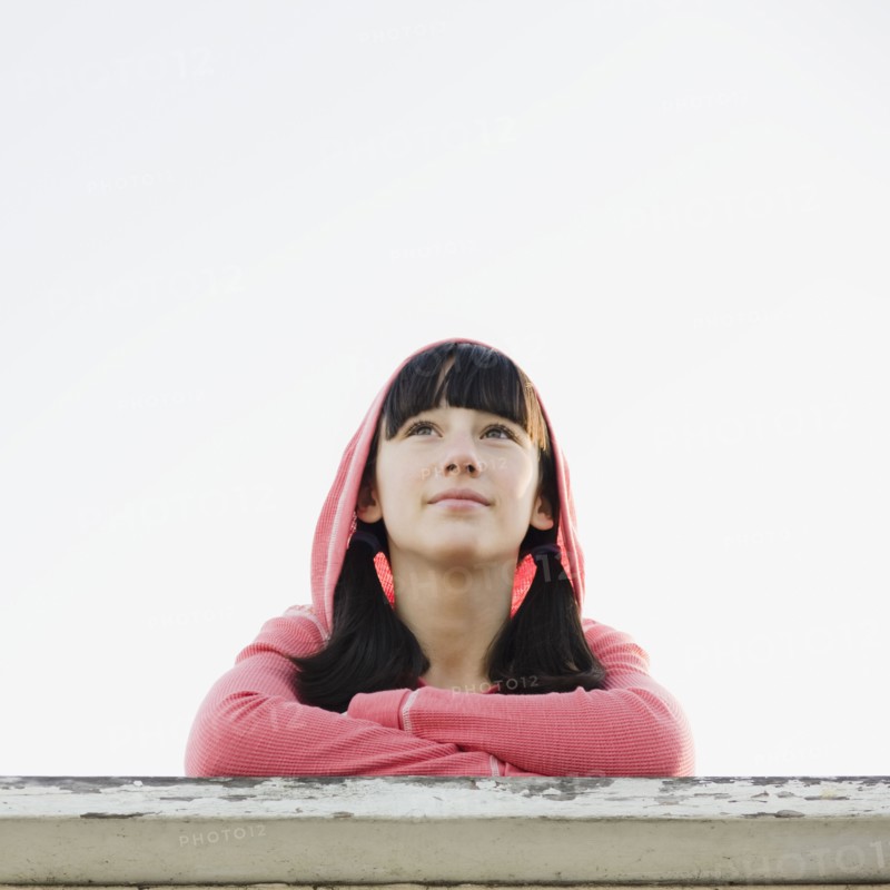 Girl leaning on railing