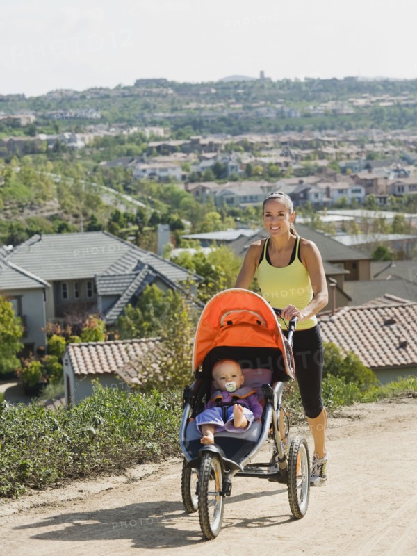 Woman pushing stroller