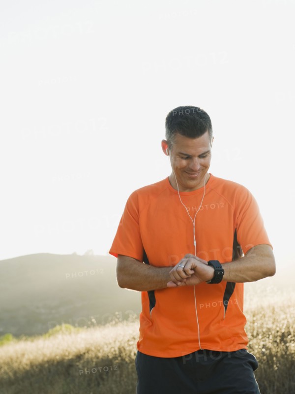 Man looking at watch