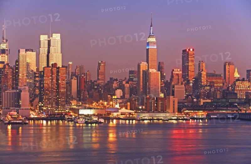 Waterfront buildings at sunset