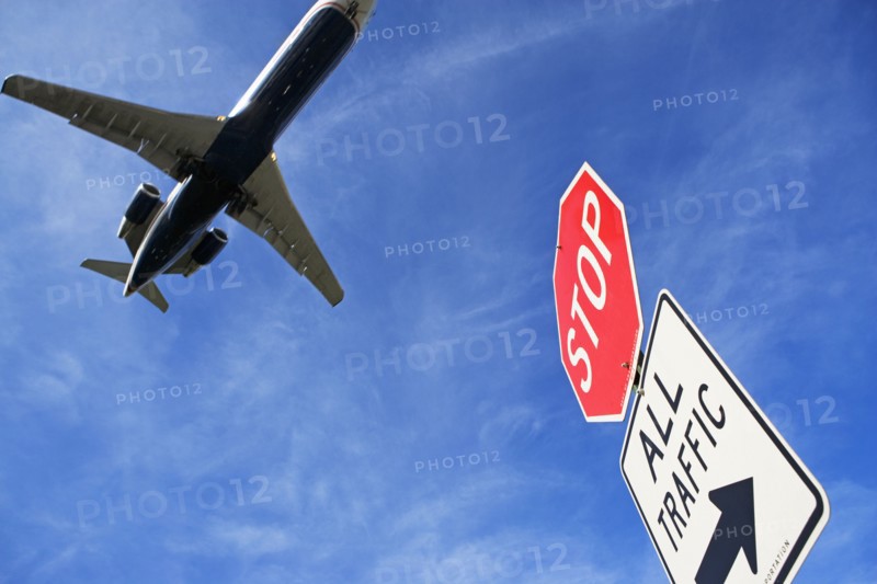 Airplane and traffic sign
