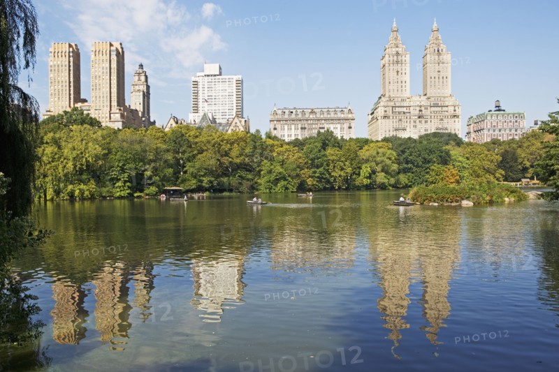 Cityscape reflected in lake