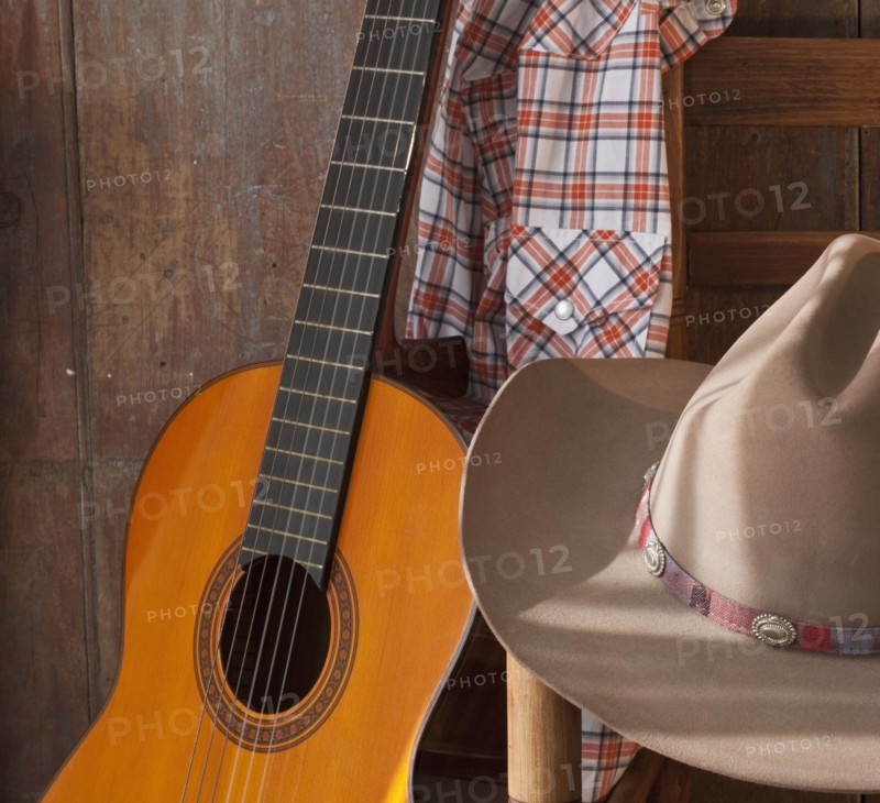 Cowboy hat and guitar.