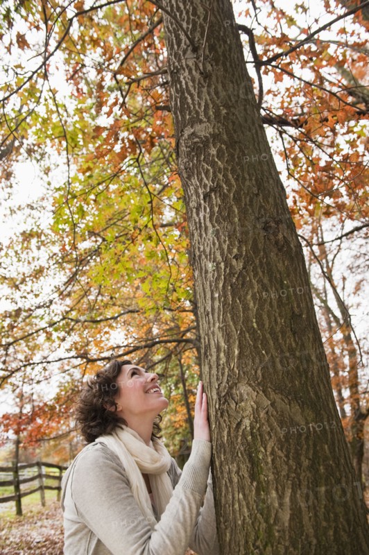 Woman looking at tree.
