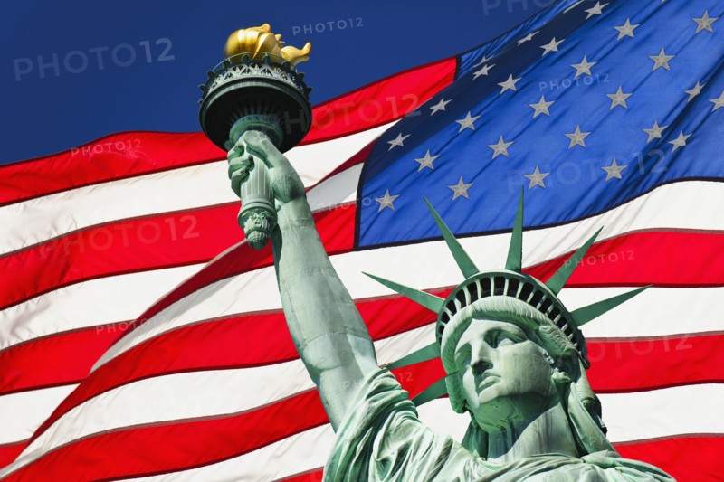 Statue of liberty and American flag.
