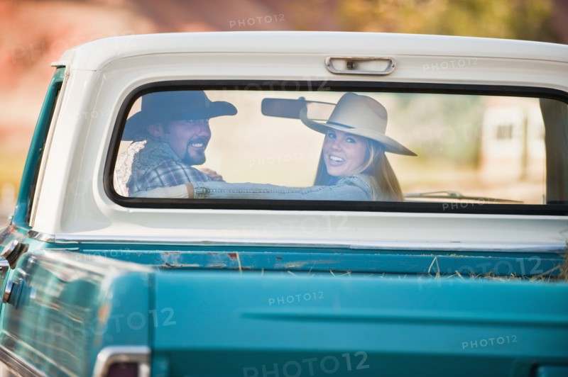 Couple in truck.