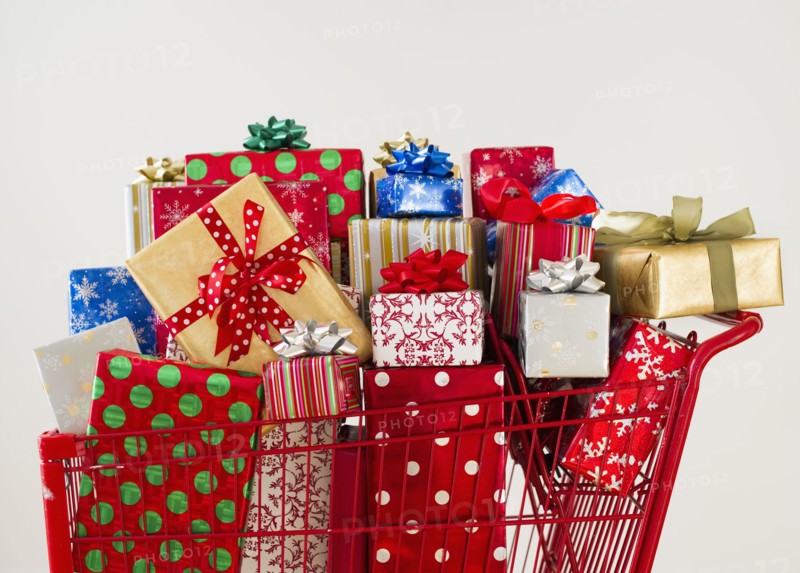 Shopping cart full of Christmas presents.