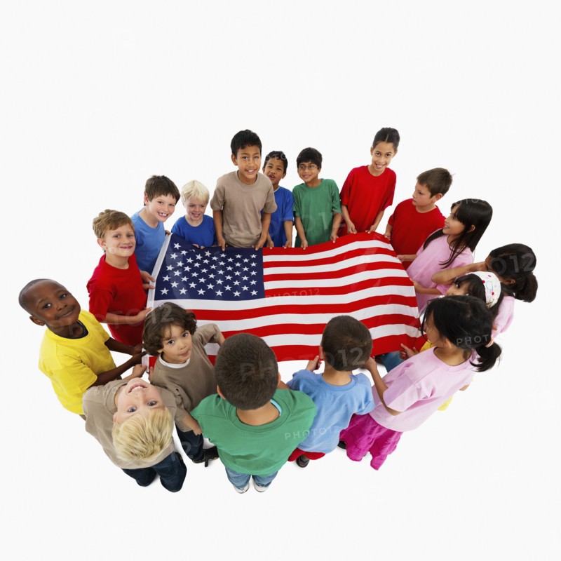 Children holding flag. Photographer: momentimages