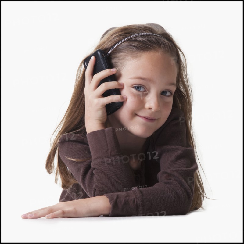 Girl on cell phone. Photographer: Mike Kemp