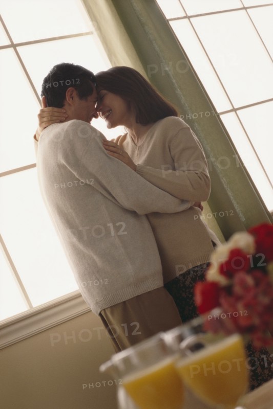 Couple embracing. Photographer: Rob Lewine