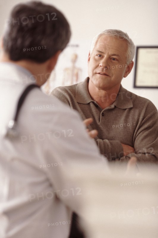 Doctor talking to patient. Photographer: Rob Lewine
