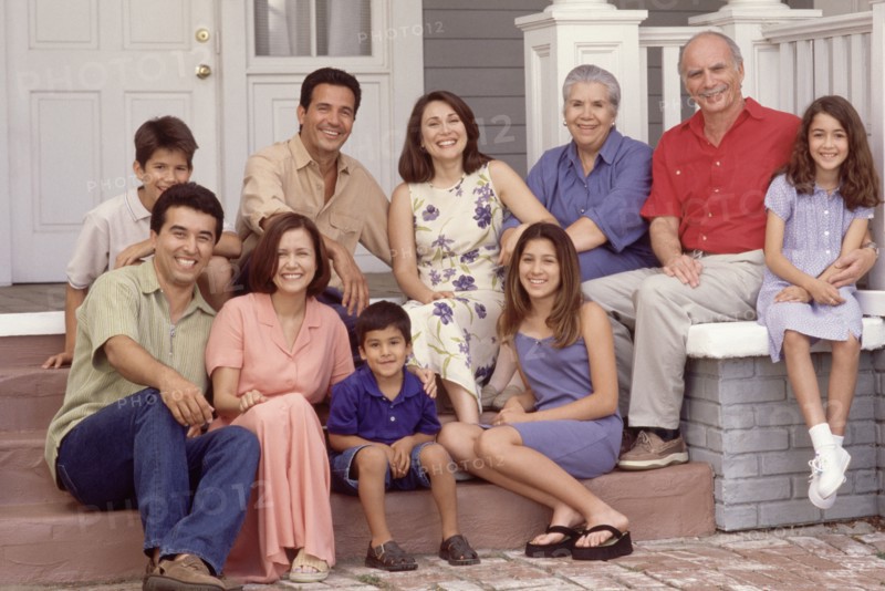 Family portrait on the porch. Photographer: Rob Lewine