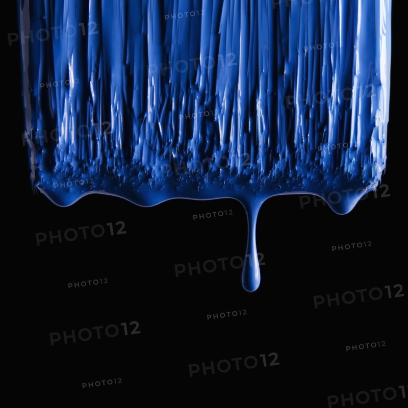 Paint brush and blue paint. Photographer: Mike Kemp