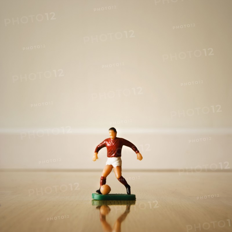 Figurine of a soccer player. Photographer: Joe Clark