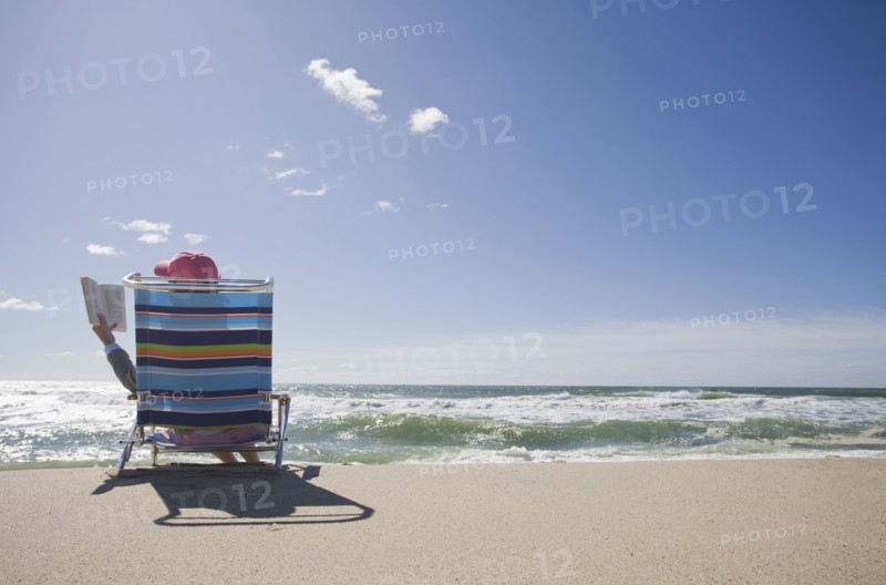 Reading at the beach. Photographer: Chris Hackett