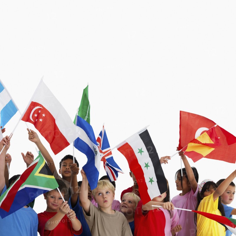 Children waving flags. Photographer: momentimages