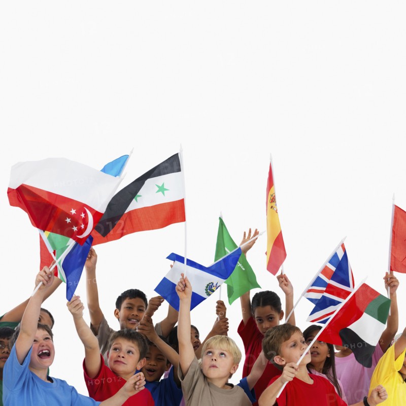 Children waving flags. Photographer: momentimages