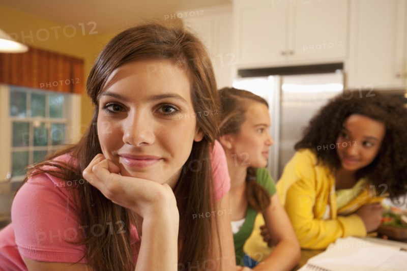 Friends doing homework. Photographer: mark edward atkinson
