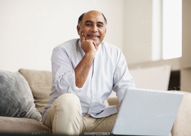 Man working on laptop. Photographer: momentimages