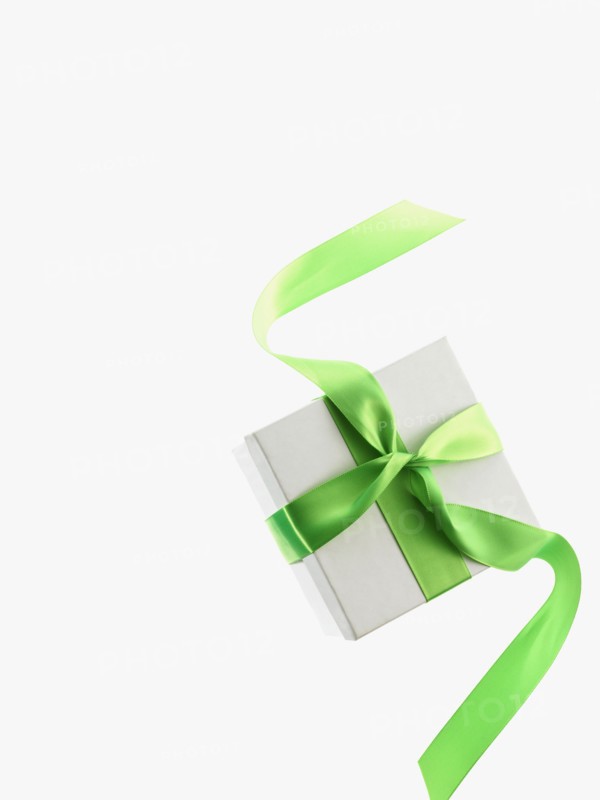 Gift and green ribbon. Photographer: David Arky