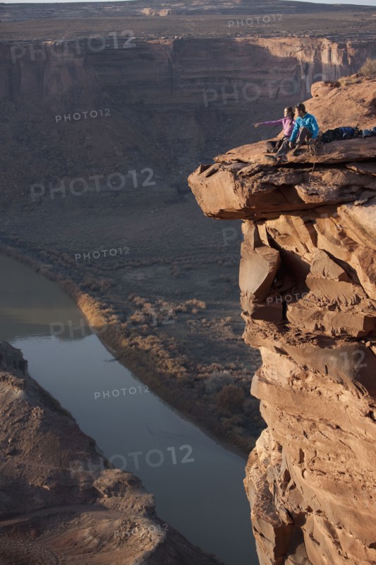 Hikers at top of cliff. Photographer: Dan Bannister