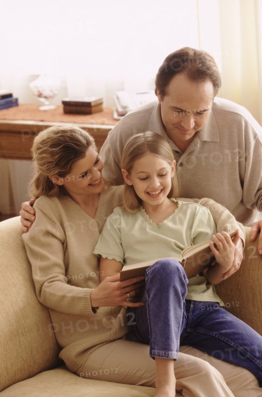 Family reading together. Photographer: Rob Lewine