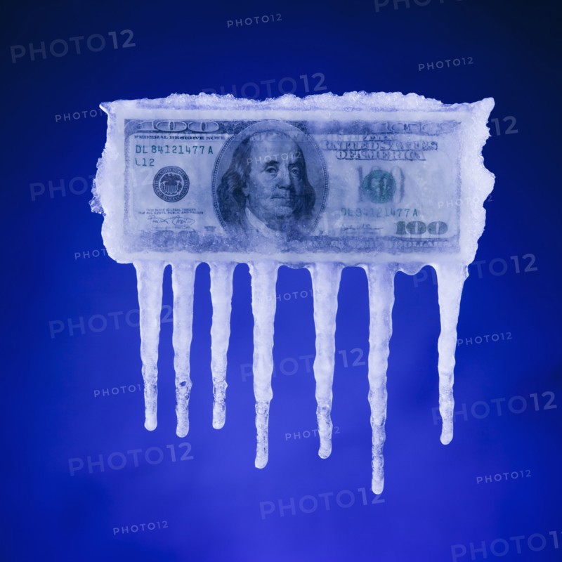 Money covered in ice. Photographer: Mike Kemp