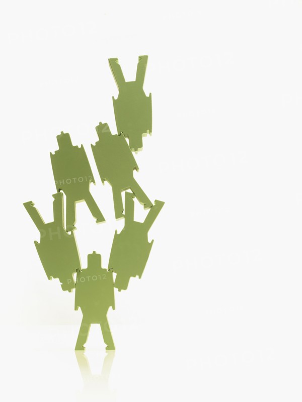 Green paper people. Photographer: David Arky