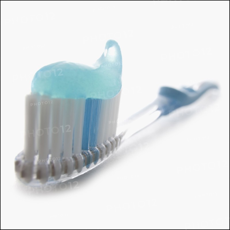 Toothbrush and toothpaste. Photographer: Mike Kemp